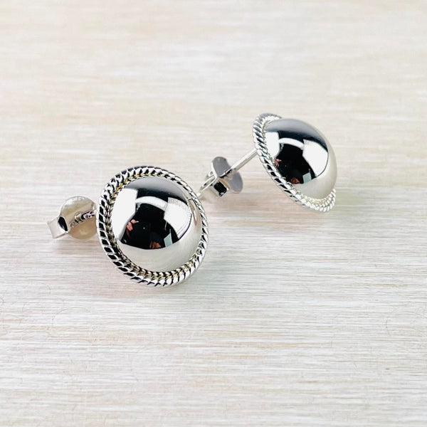 Sterling Silver Domed Stud Earrings with Decorative Edging.