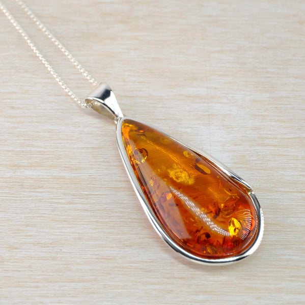 Long Elegant Cognac Amber and Silver Pendant.