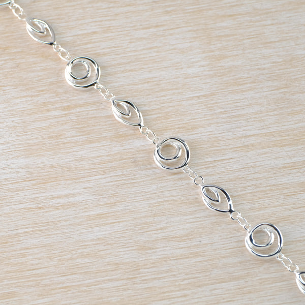 Polished Sterling Silver Swirl Link  Bracelet by JB Designs.