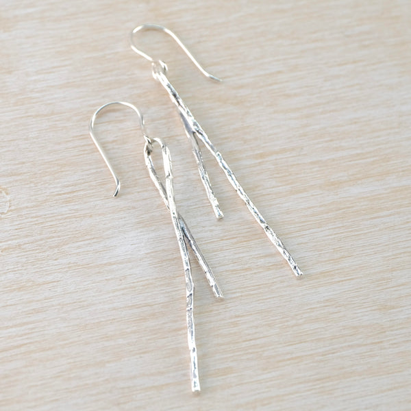 Long Textured Silver Double Stick Drop Earrings by JB Designs.