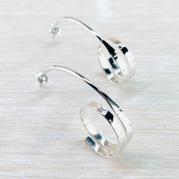 Sterling Silver Elongated Hoop Earrings.