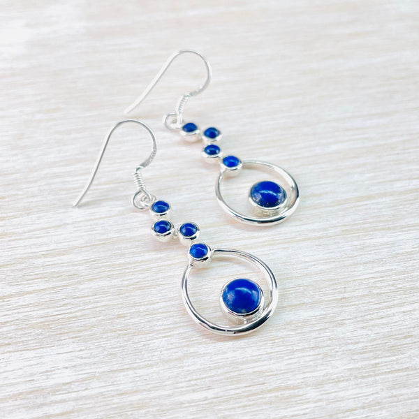 Sterling Silver And Staggered Lapis Lazuli Drop Earrings with Silver Hoop.