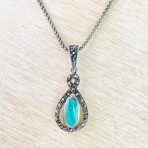 Sterling Silver, Turquoise and Marcasite Twist Pendant.