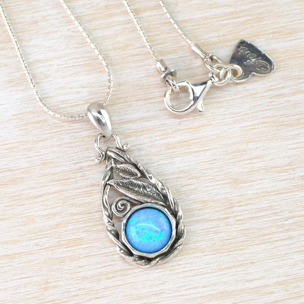 Sterling Silver and Opal Tear Drop Pendant in an Art Nouveau Style.