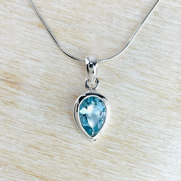 Inverted Tear Drop Blue Topaz and Sterling Silver Pendant.