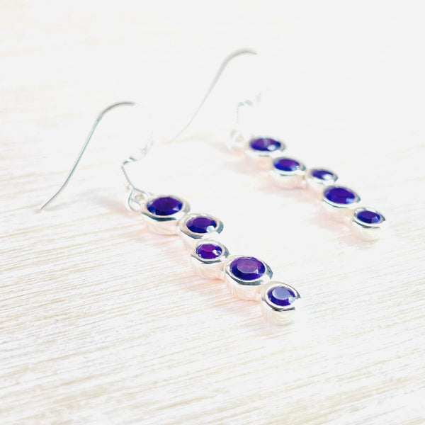 Sterling Silver Staggered Drop Faceted Amethyst Earrings.