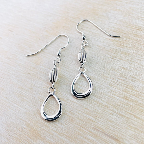 Sterling Silver Pod and Tear Drop Earrings.