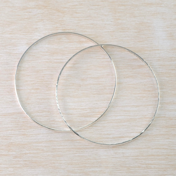 Set of 2 Separate Sterling Silver Bangle Bracelets.