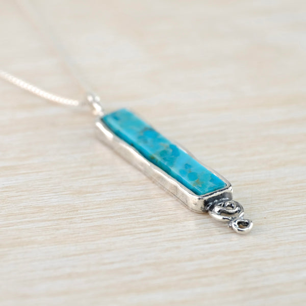 Long Slim Sterling Silver and Turquoise Pendant.