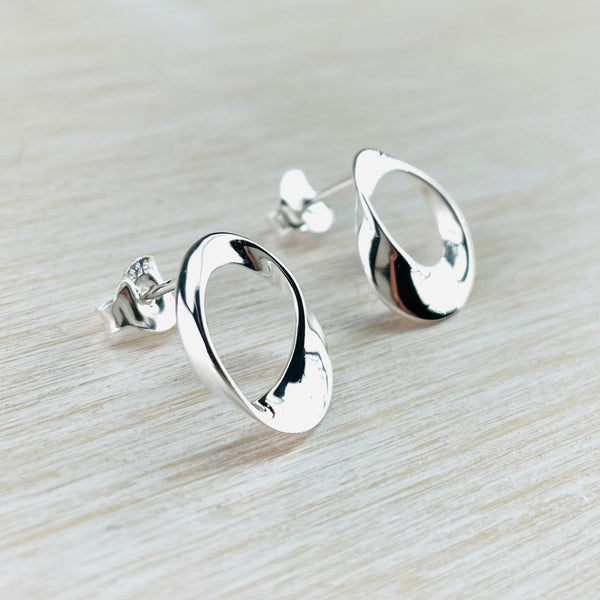 Polished Sterling Silver Curved Mobius Stud Earrings by JB Designs.