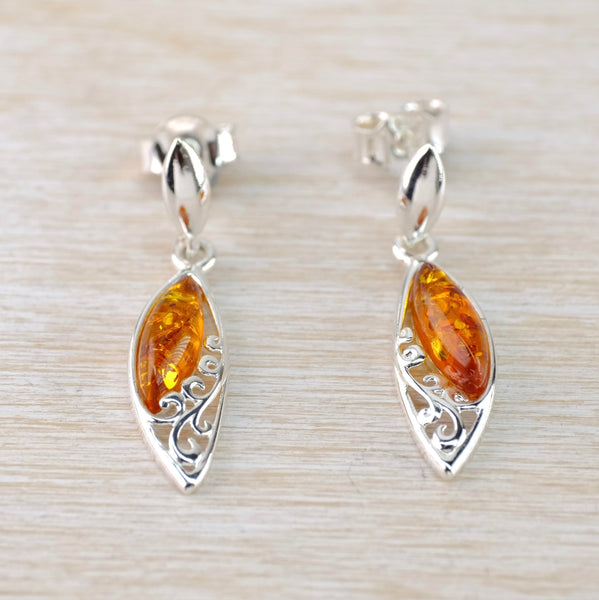 Cognac Amber and Decorative Sterling Silver Drop Earrings .