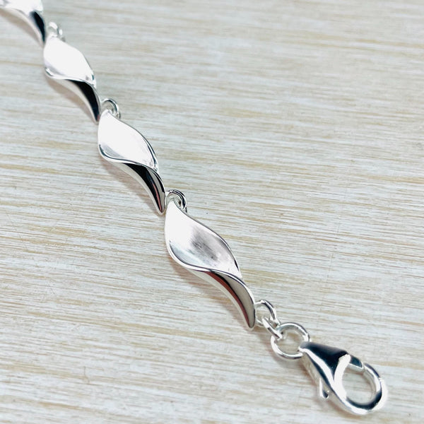 Sterling Silver Curved Leaf Design Bracelet by JB Designs.