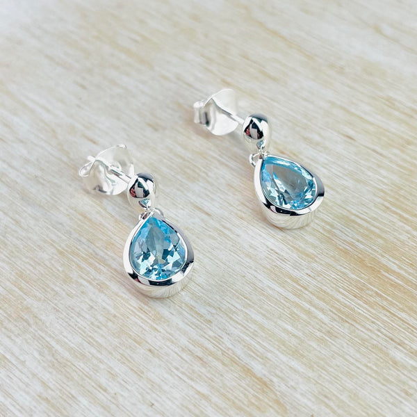 Tear Drop Blue Topaz and Silver Stud Earrings by JB Designs.