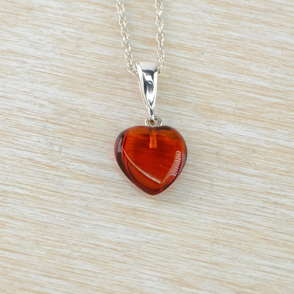 Small Amber and Sterling Silver Heart Pendant.