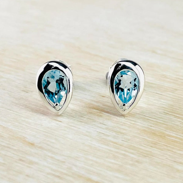 Inverted Tear Drop Blue Topaz and Silver Stud Earrings by JB Designs.