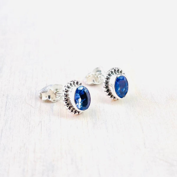 Small Sterling Silver and Tanzanite Stud Earrings.