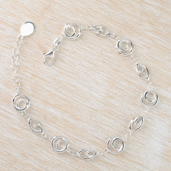 Polished Sterling Silver Swirl Link  Bracelet by JB Designs.