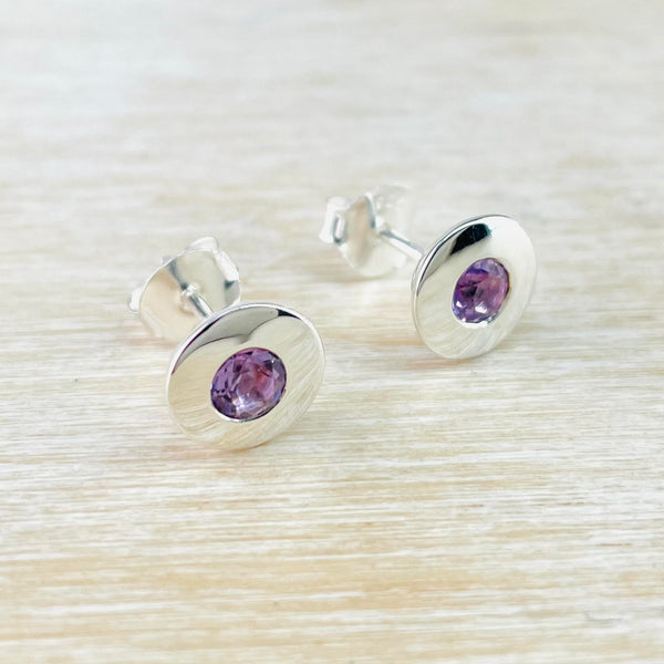 Round Sterling Silver and Amethyst Stud Earrings.