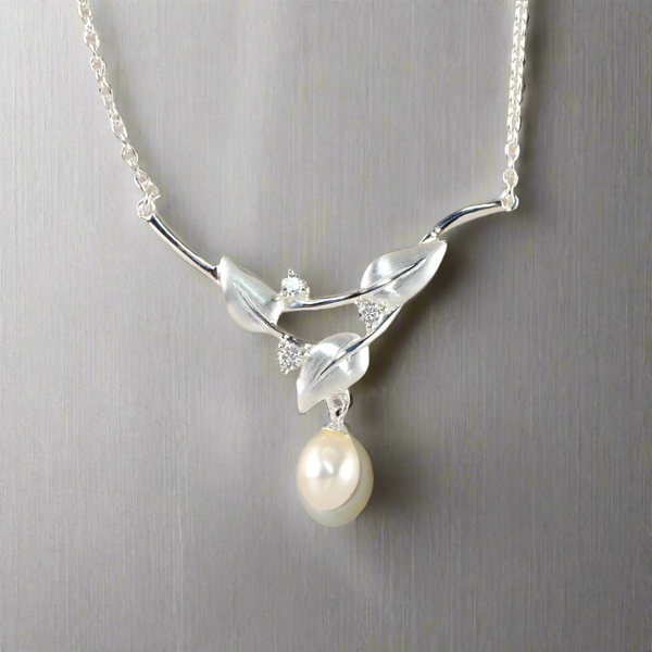 Sterling Silver, Pearl and Cubic Zirconia Leaf Necklace by JB Designs.