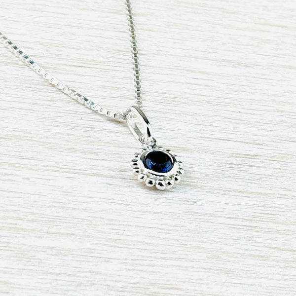 Small Sterling Silver and Iolite Pendant.