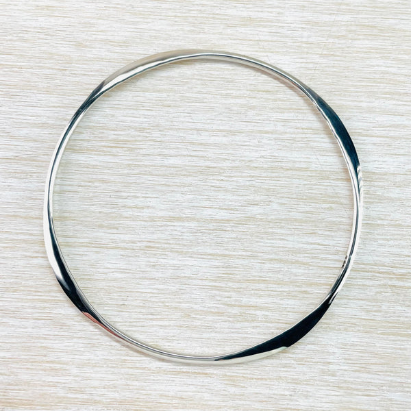 Round Hammered Flattened Edge Sterling Silver Bangle.
