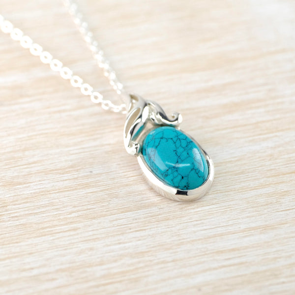 Sterling Silver and Turquoise Pendant with Decorated Top.
