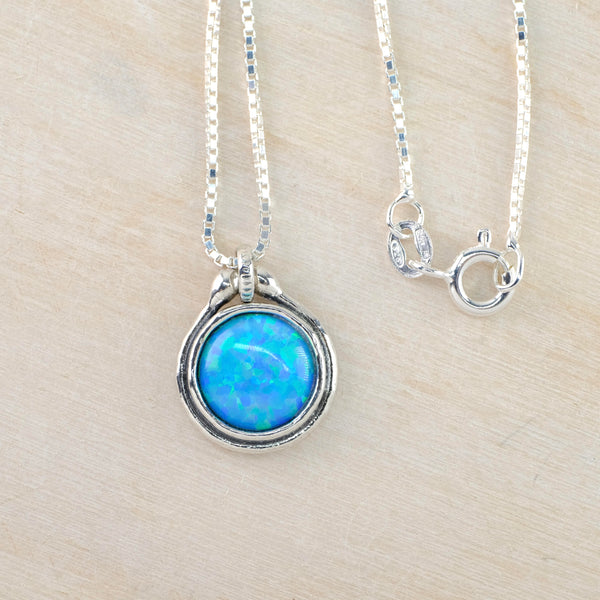 Small Round Sterling Silver and Opal Pendant.