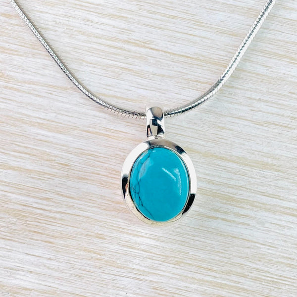 Small Chunky Sterling Silver and Oval Turquoise Pendant.