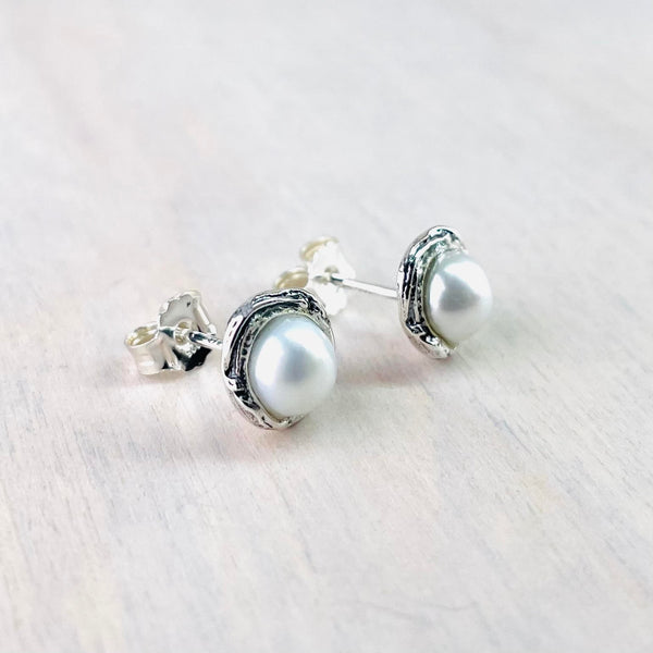 Round Sterling Silver and Freshwater Pearl Stud Earrings.