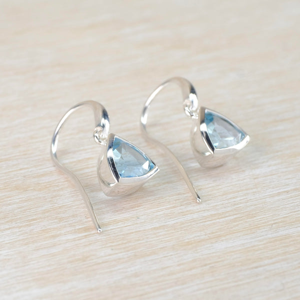 Sterling Silver and Blue Topaz 'Trillion Cut' Drop Earrings by JB Designs.