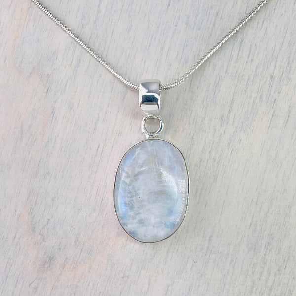 Sterling Silver and Oval Rainbow Moonstone Pendant.