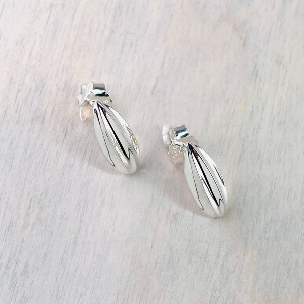 Polished Ribbed Silver Stud Earrings by JB Designs.