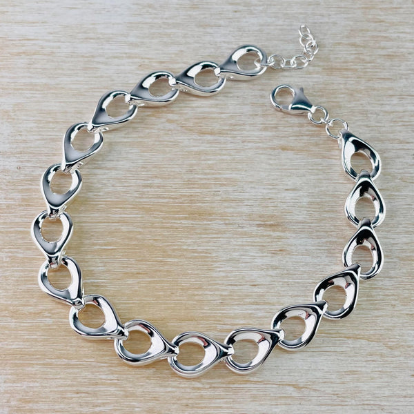 Polished Sterling Silver Linked Bracelet by JB Designs.