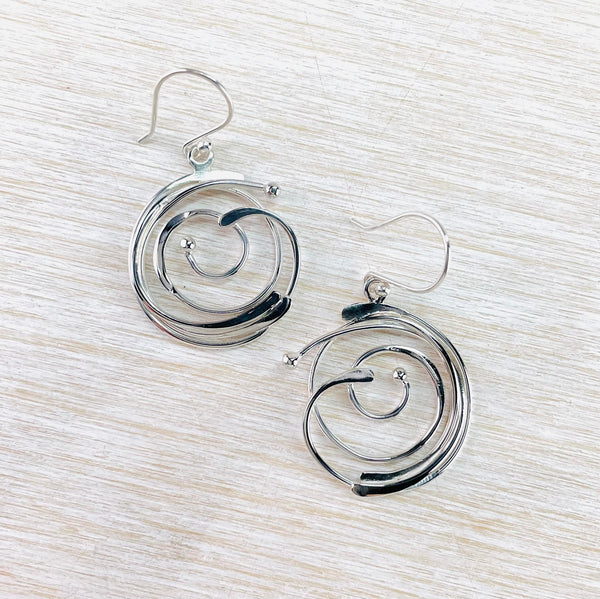 Swirl earrings deals