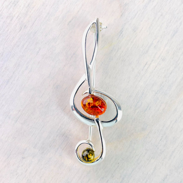 Sterling Silver and Amber Treble Clef Brooch.