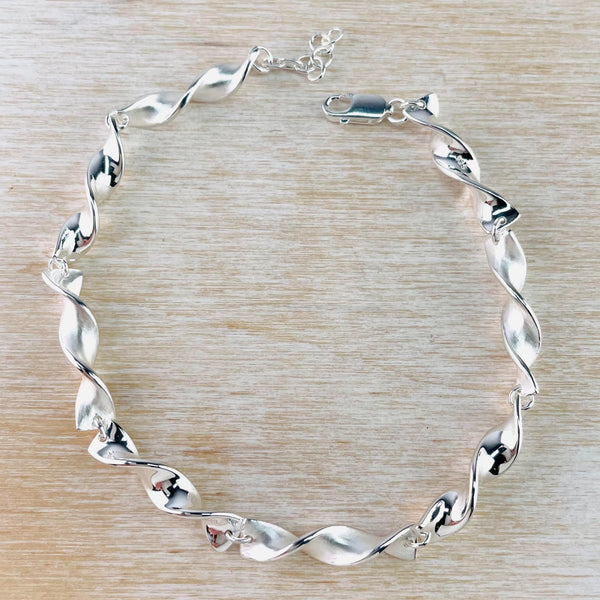 Twist Design Brushed and Polished Sterling Silver Bracelet by JB Designs.