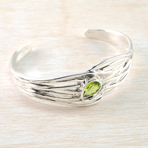 Sterling Silver and Peridot Wave Torque Bangle Bracelet.