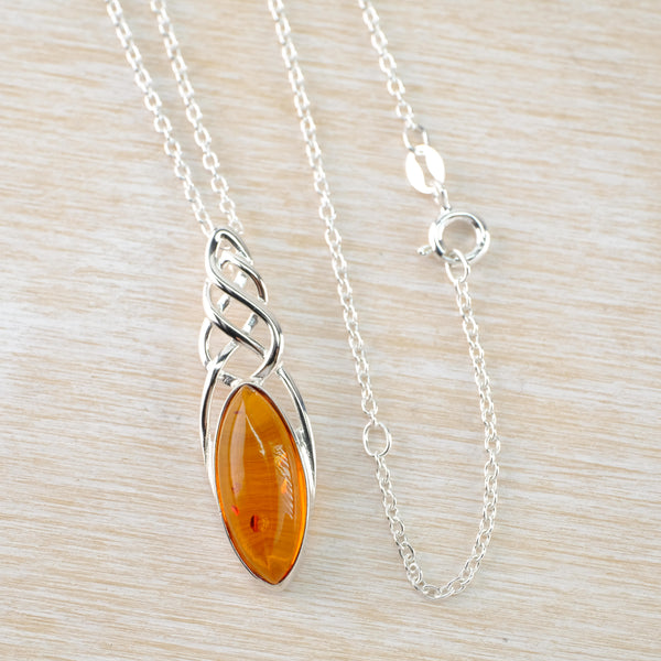 Celtic Design Sterling Silver and Amber Pendant.