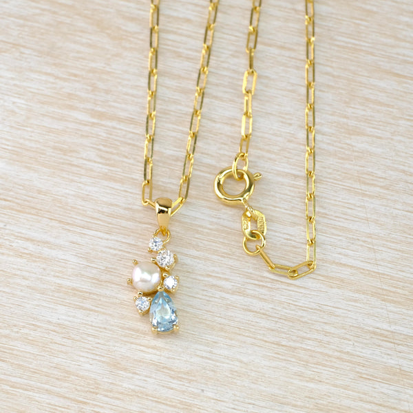Gold Plated Silver Pendant with Blue Topaz, Pearl and CZ.