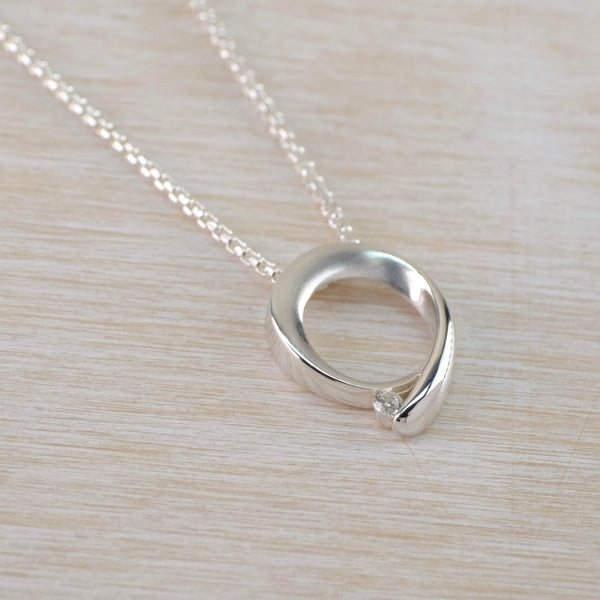 Satin and Shiny Sterling Silver Open Circle Pendant with Cz by JB Designs.