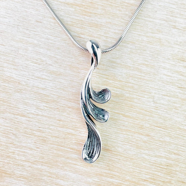 Sculpted Sterling Silver Wave Pendant.