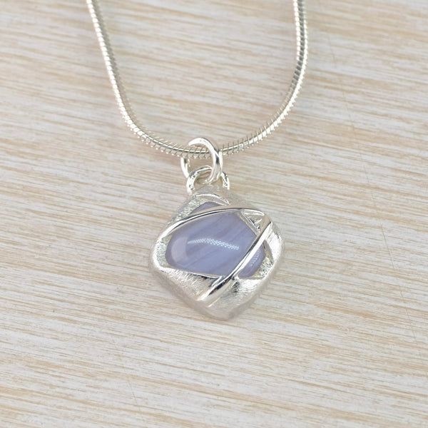Satin and Polished Sterling Silver and Blue Lace Agate Pendant.
