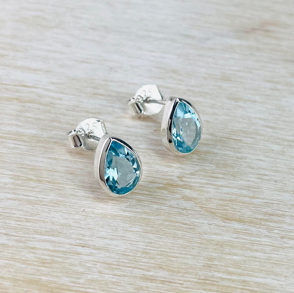 Tear Drop Blue Topaz and Silver Stud Earrings.