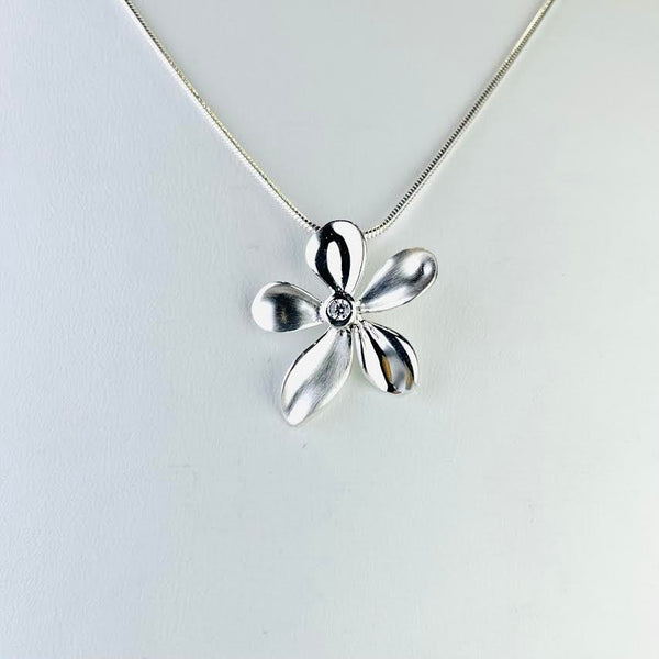 Silver and CZ Flower Drop Pendant by JB Designs.
