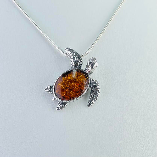 Amber and Sterling Silver Turtle Pendant.