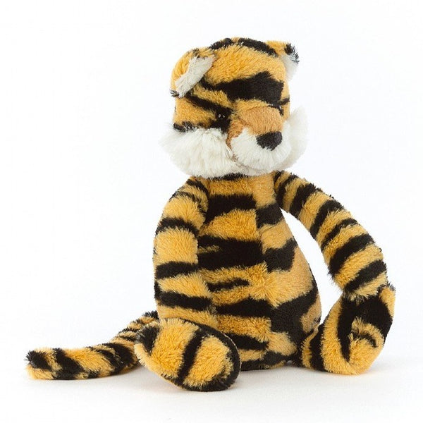 Jellycat friendly looking tiger. He has orange and black stripes with fluffy white cheeks and inside his ears. Shiny black eyes and a long tail. He is sitting down with his arms out stretched.