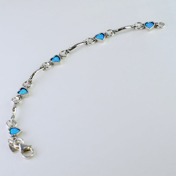 Silver and Opal Heart Linked Bracelet.