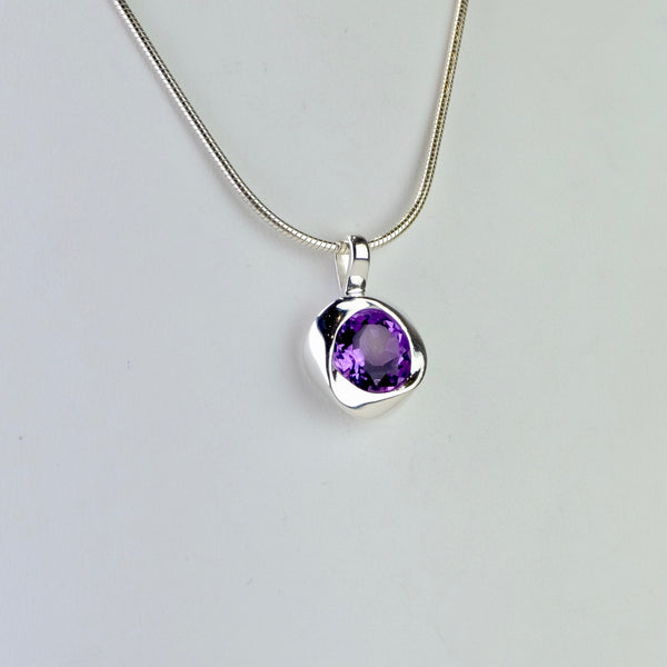 Faceted Amethyst and Sterling Silver Pendant.