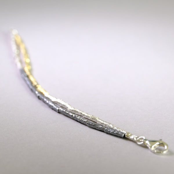 Double Strand Fine Cylindrical Sterling Silver Bracelet by JB Designs.