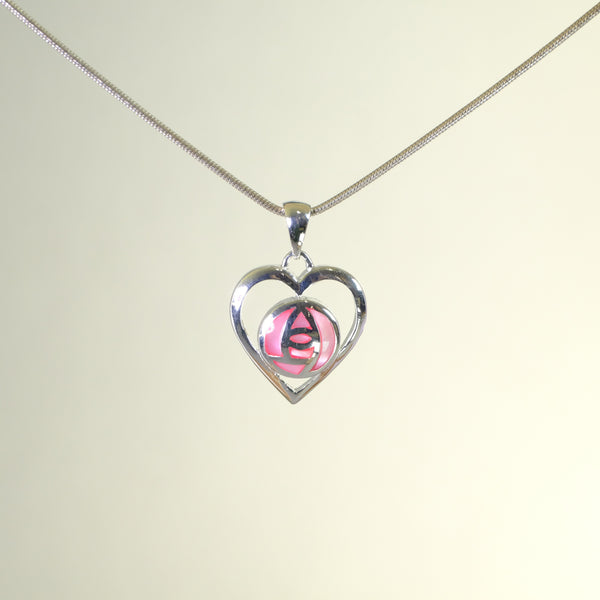 Sterling Silver and Pink Shell Mackintosh Style Pendant.